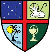 A shield with a cross a lamb a palm tree and a chalice