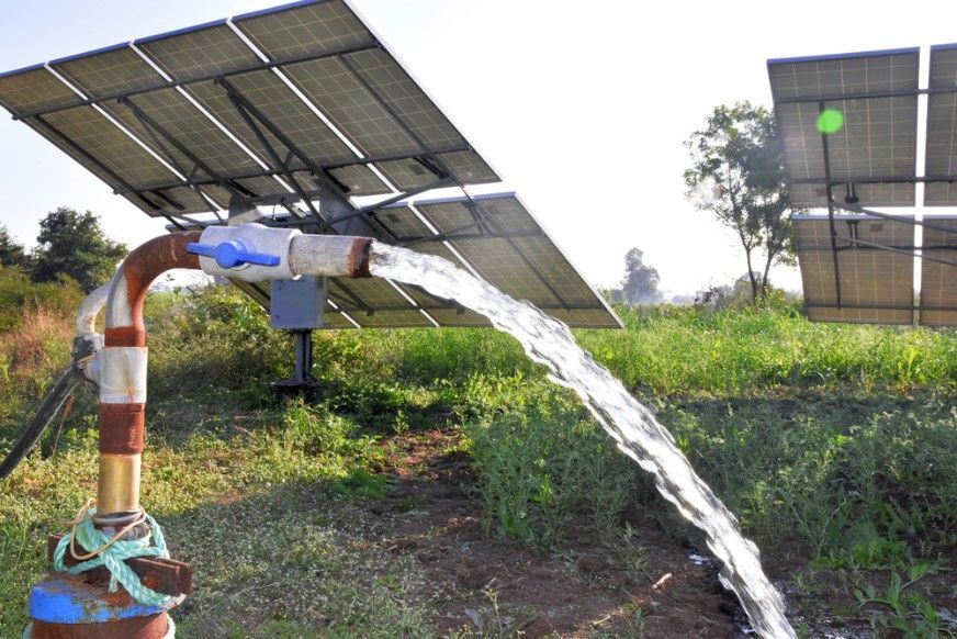 A Water Pump is Connected to a Solar Panel in a Field — Wade N Water In Gunnedah, NSW