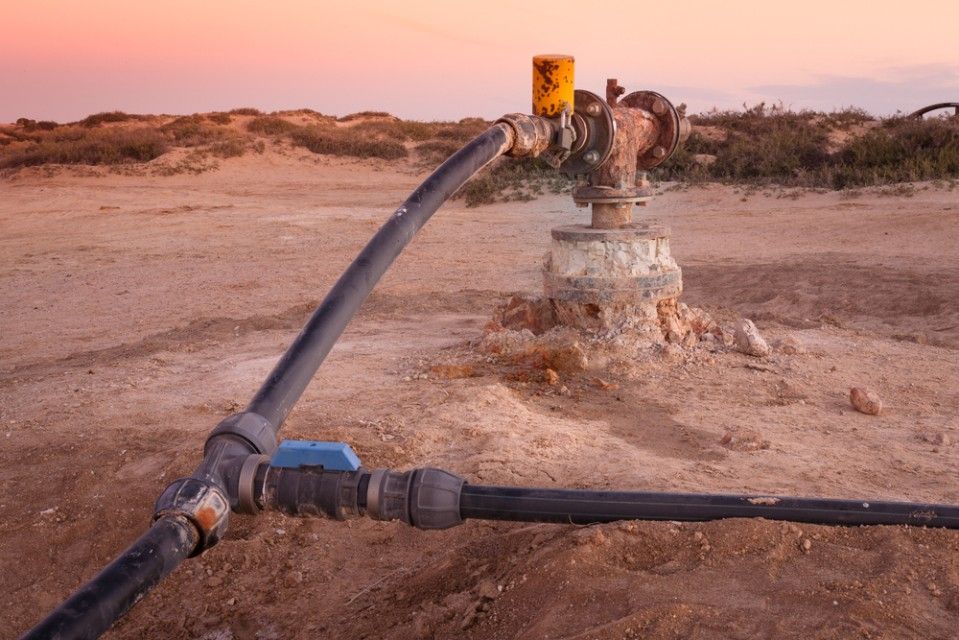 A Hose is Connected to a Valve in the Desert — Wade N Water In Nemingha, NSW
