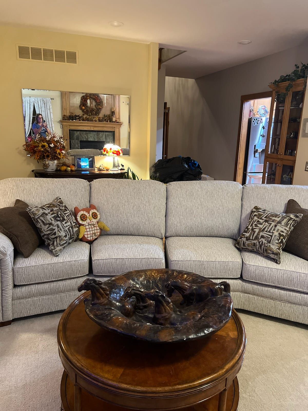 A living room with a couch and a coffee table