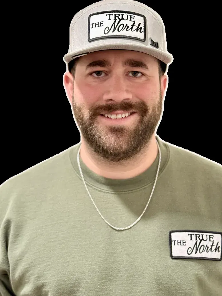 Man with a beard wearing a 