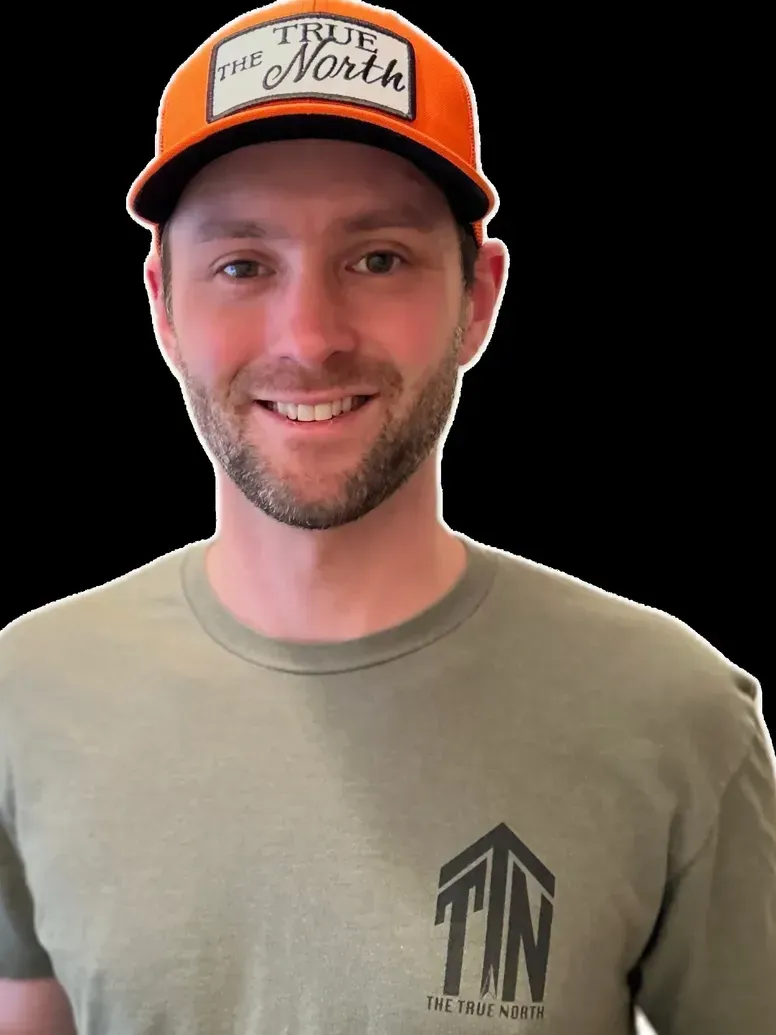 Man wearing orange 