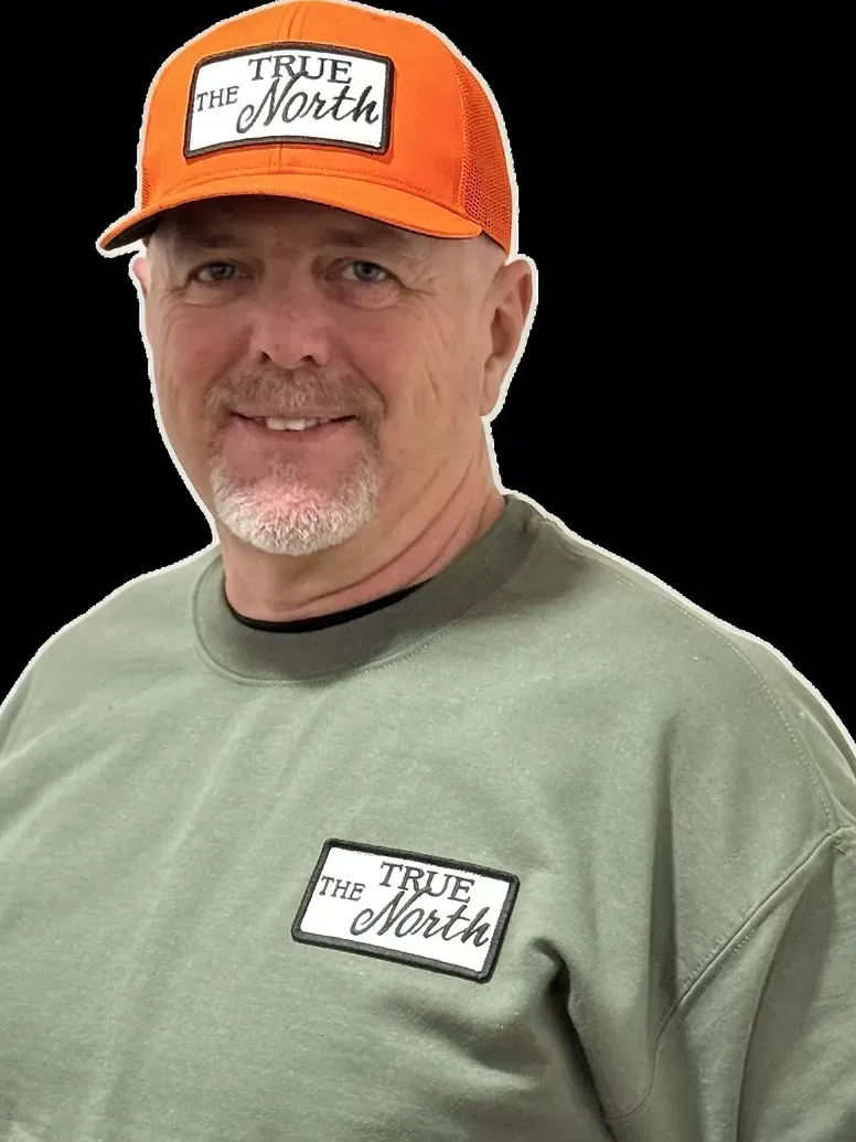 Man wearing orange 