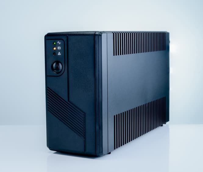 A Black Ups Is Sitting On A White Surface — D-stress Computers In Idalia, QLD