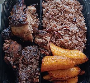 Jamaican jerk chicken with rice, plantains, in a black takeout container.