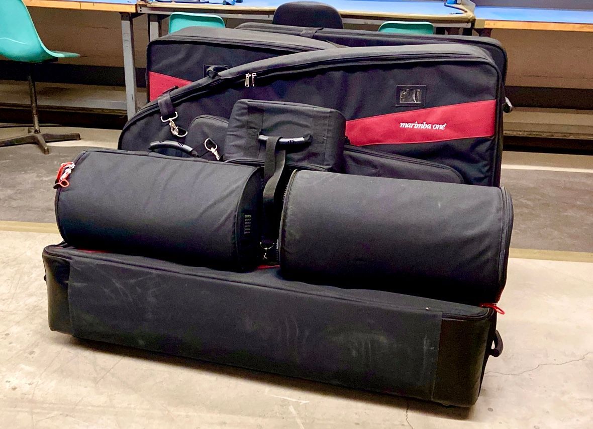 Seven Marimba One padded cases onsite in Commerce Packaging. An entire marimba was deconstructed into pieces and those pieces were placed in the seven cases.