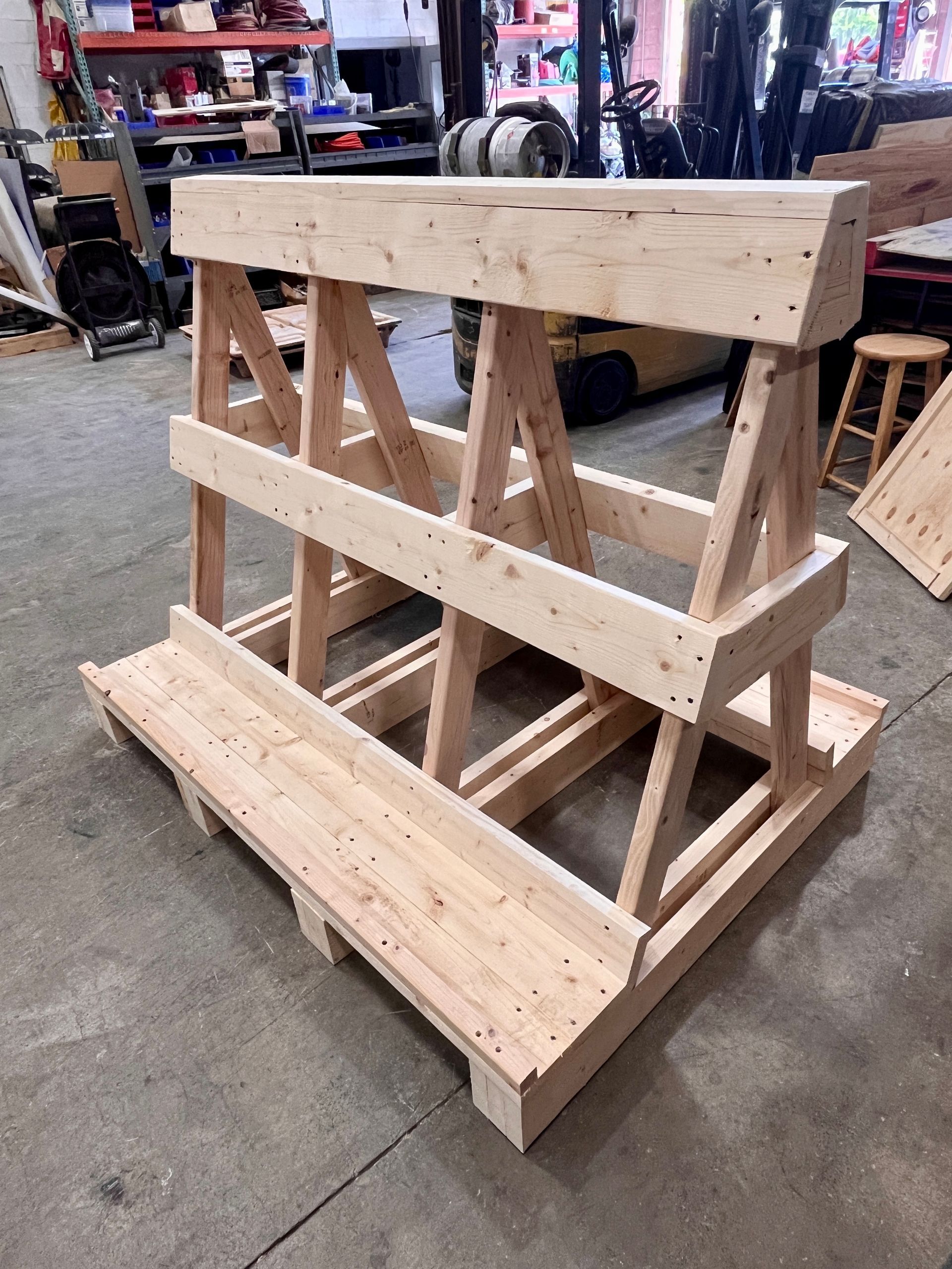 The A-frame glass storage rack at the part of the process where all the wood was assembled together, but before any felt was attached.