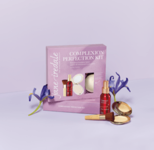 Jane Iredale Teint-Perfektions-Set mit Blumen im Hintergrund