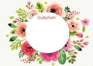 Es gibt einen Kreis mit Blumen und Blättern drumherum.