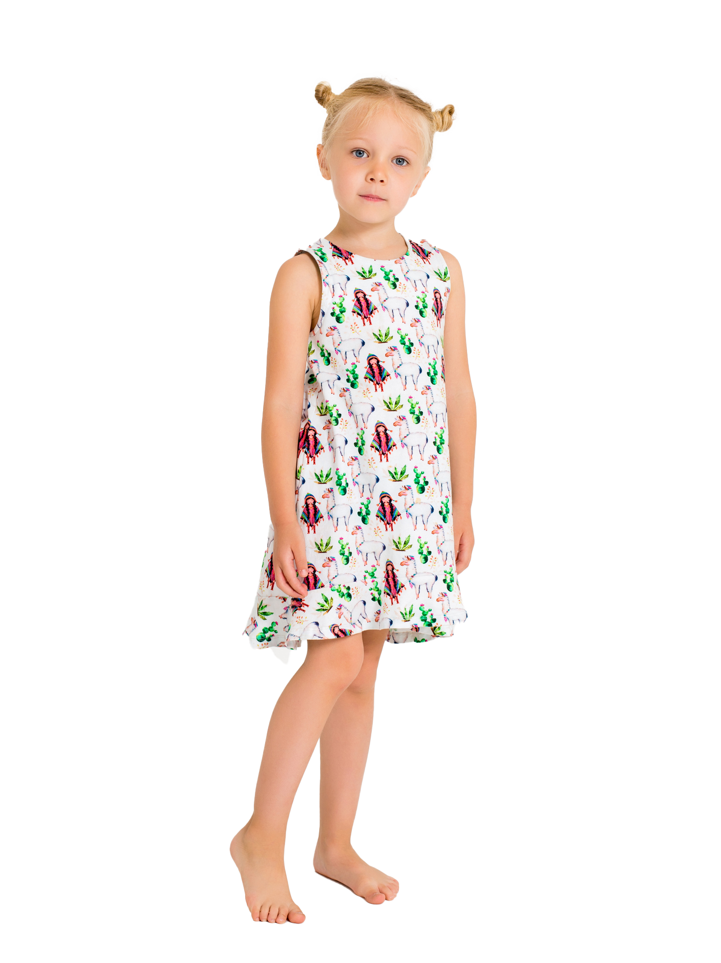 Girl wearing a patterned dress, standing barefoot, looking at the camera.