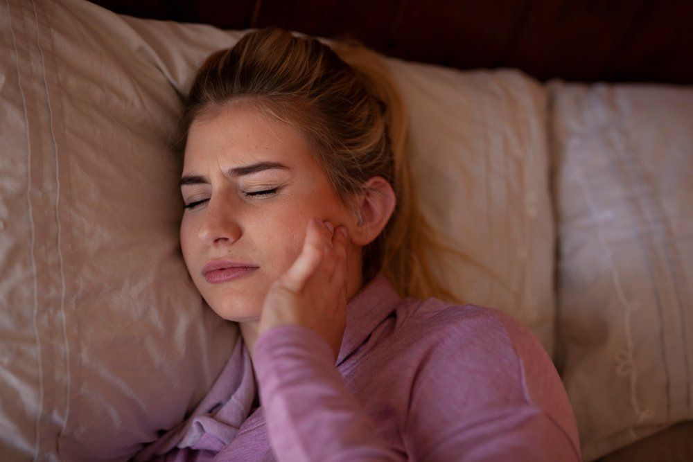 Girl with TMJ Disorder — Belconnen, ACT — Belconnen Dental Centre