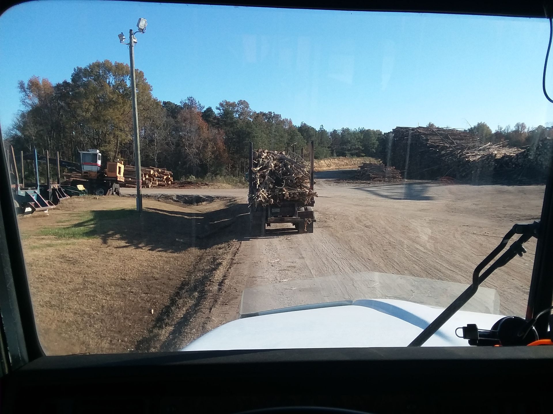 Log Truck On Dirt Road