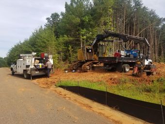 Large Yellow Truck — Charlotte, NC — CSS Clearing & Grading LLC