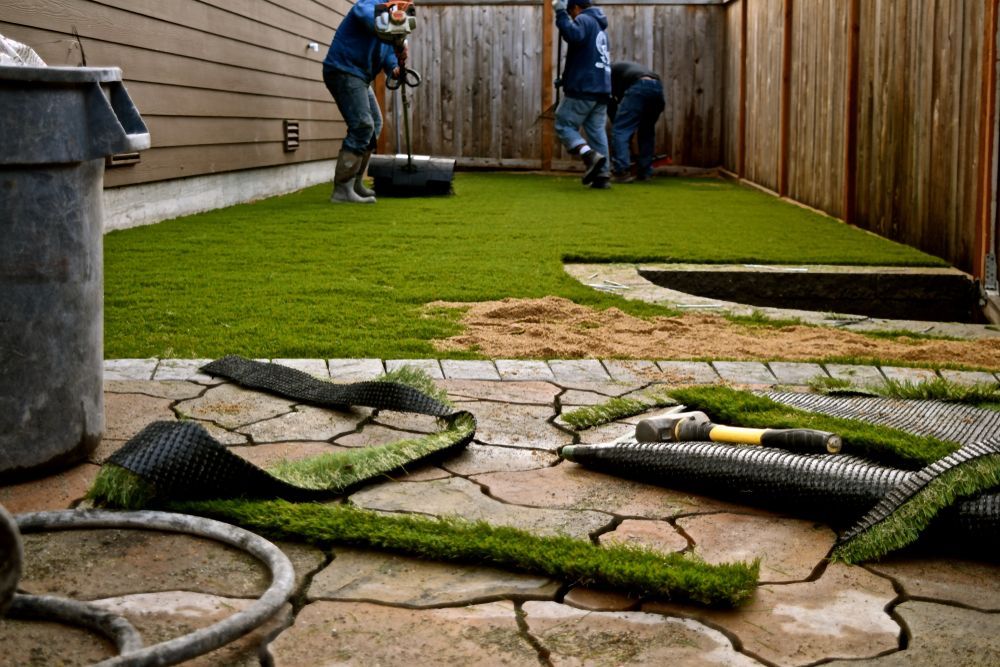 Outdoor Transformations installed artificial grass in Nocatee, FL, for a natural look with no mowing required.