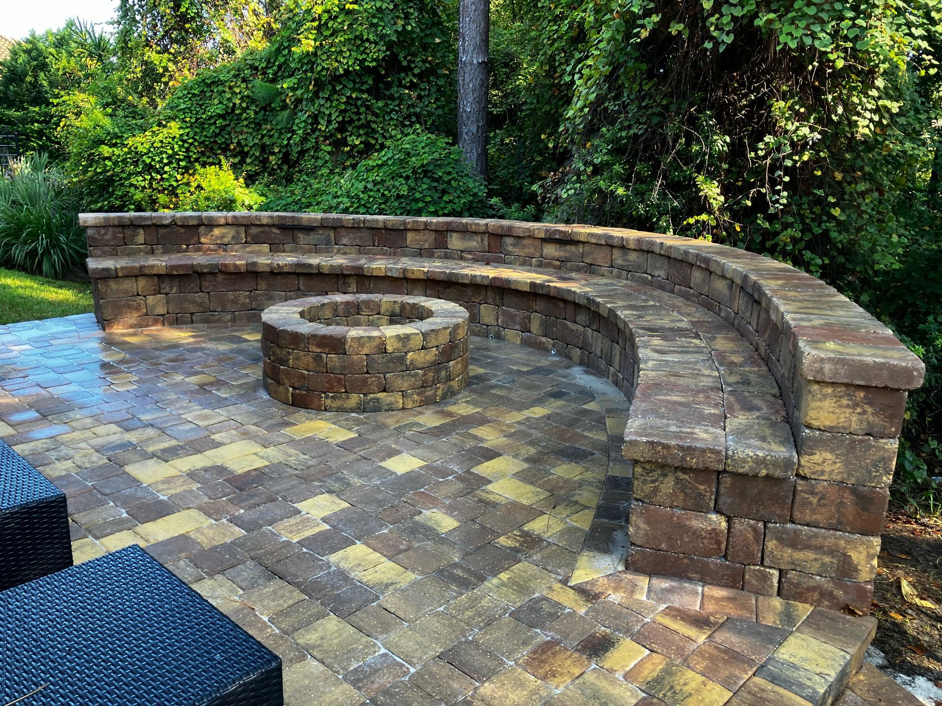 Outdoor Transformations installed a paver fire pit with seating in St. Augustine, FL, for year-round outdoor use.