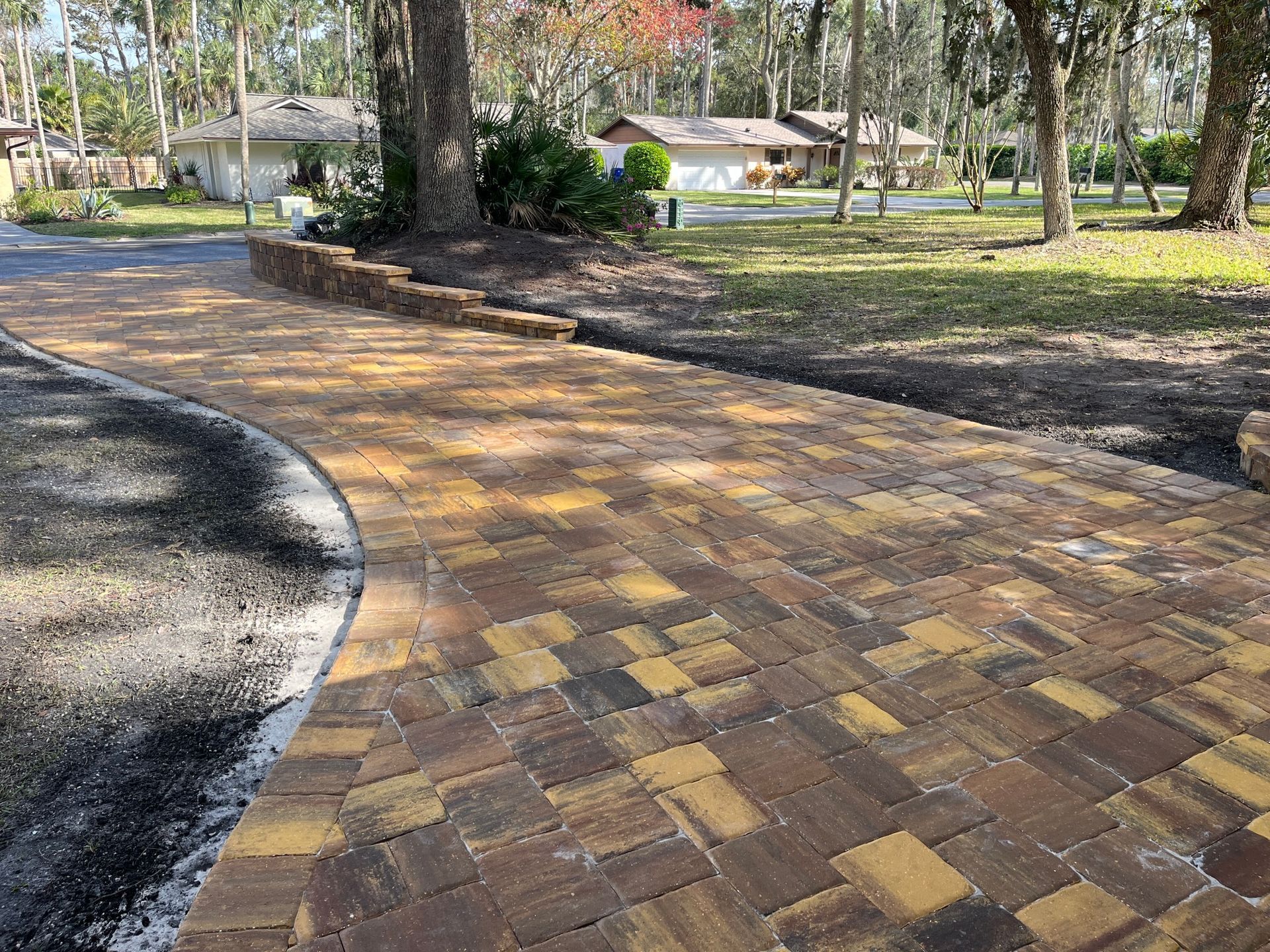 Outdoor Transformations installed Tremron pavers in St. Augustine, FL, for a strong and stylish driveway.