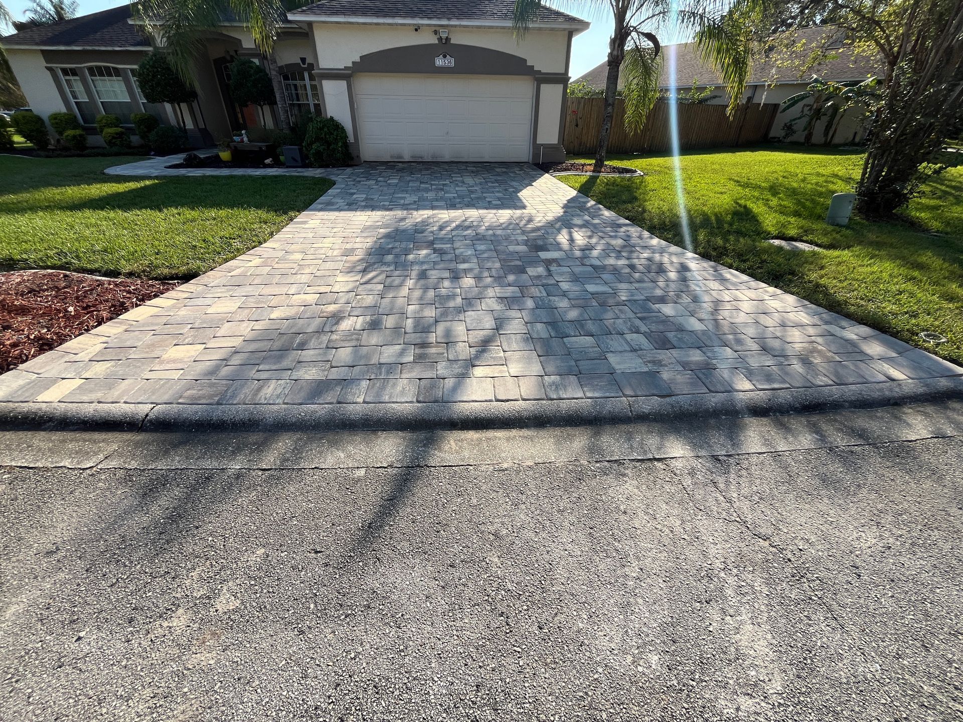 Outdoor Transformations installed Tremron pavers in St. Augustine, FL, for a strong and stylish driveway.