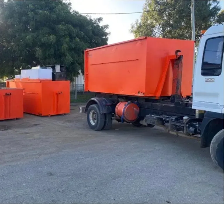 Orange Industrial Containers on Truck Bed; Parked Outdoors — Bob’s Trailer Trash in Rockhampton, QLD