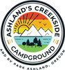 Ashland&rsquo;s Creekside Campground logo with sun, mountains, river, trees, and RV park text, Ashland, Oregon