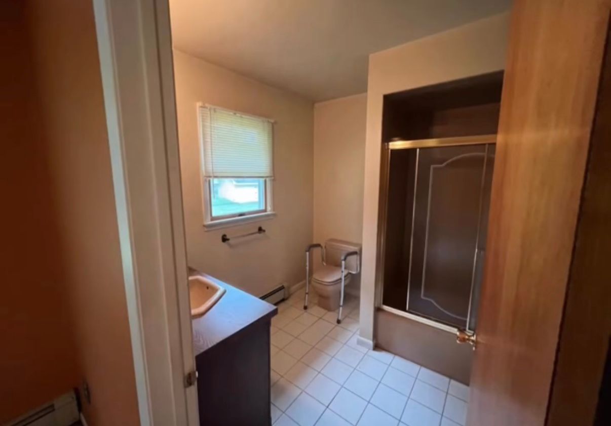 Bathroom before renovation Bergen County NJ outdated fixtures