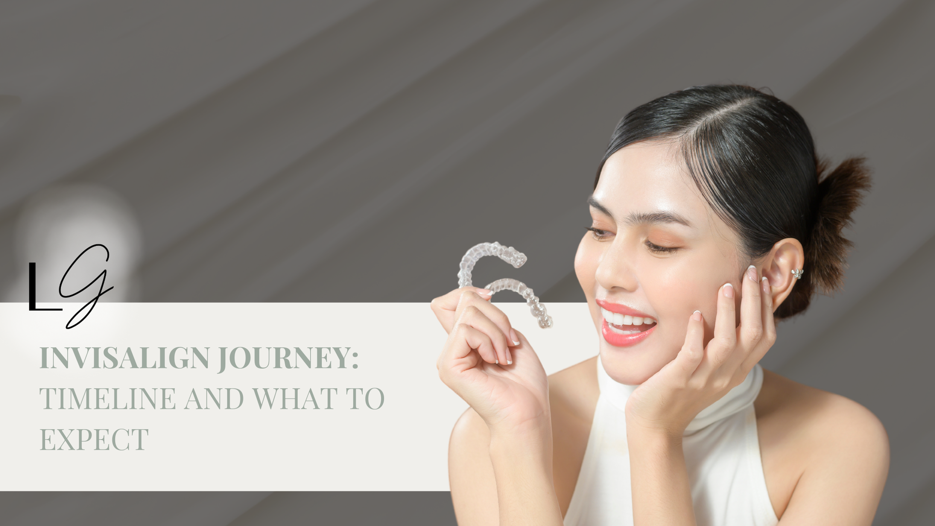 A woman is holding a pair of invisalign aligners in her hands.