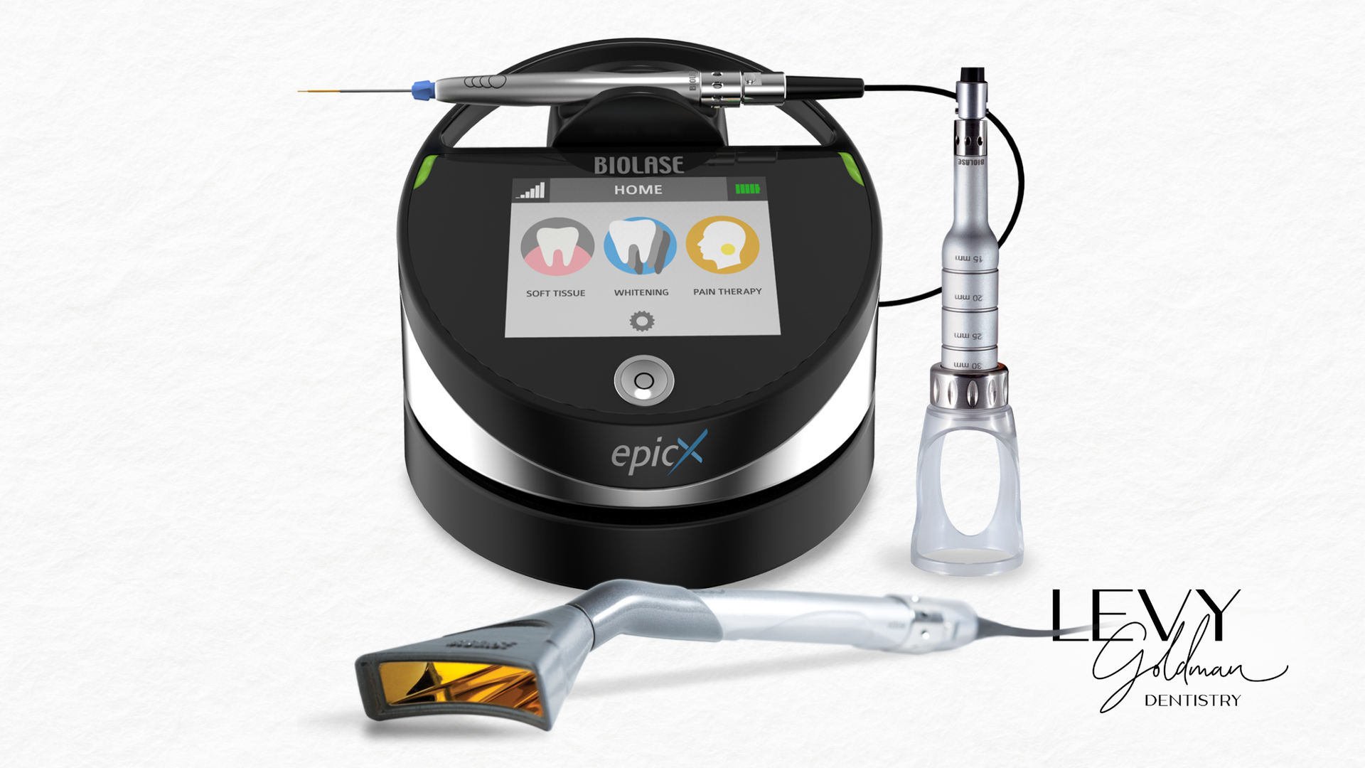 A dental laser is sitting on top of a white table.