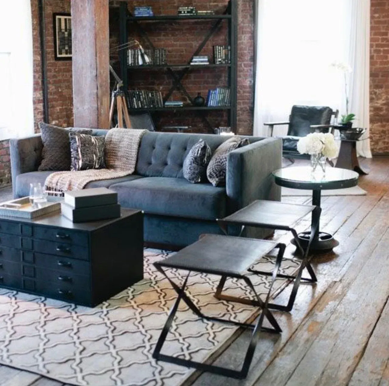 A living room with a couch and a table