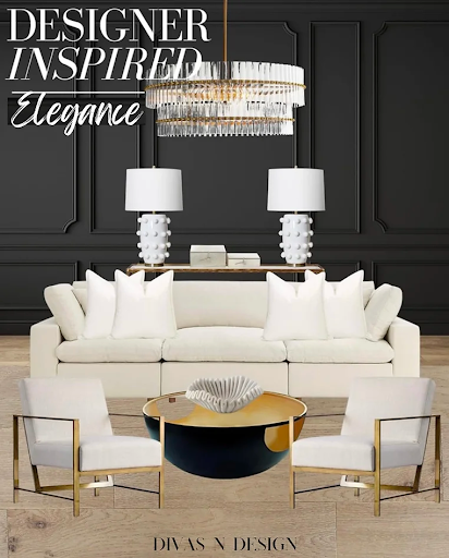 A living room with a white couch , two chairs , a coffee table and a chandelier.