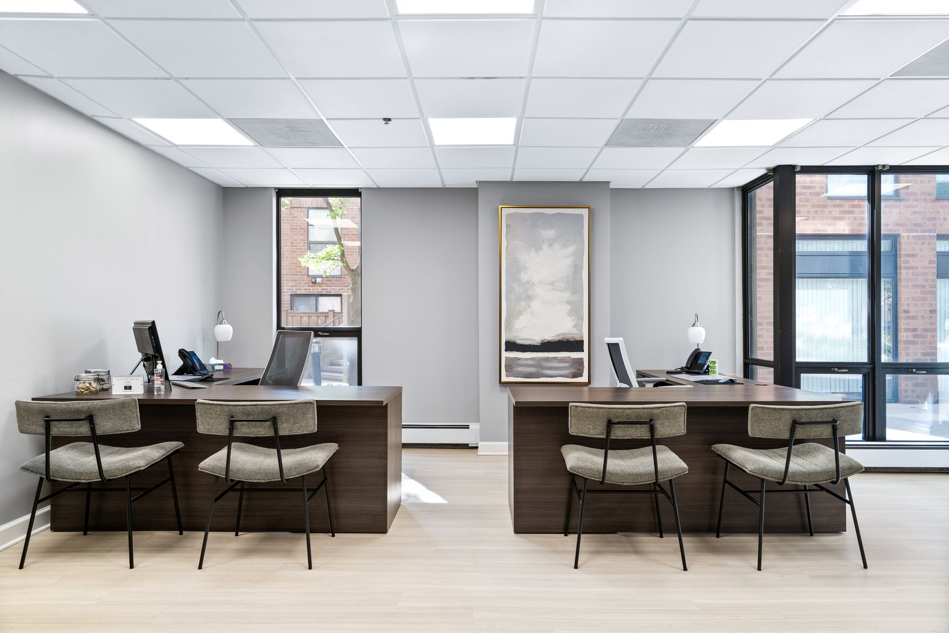 two desks in the 100 Forest Place leasing center