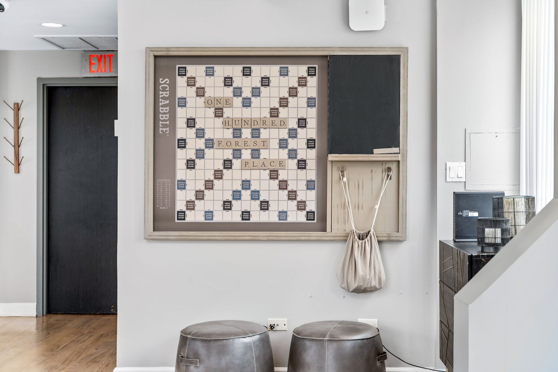 Scrabble-inspired art work with tiles spelling