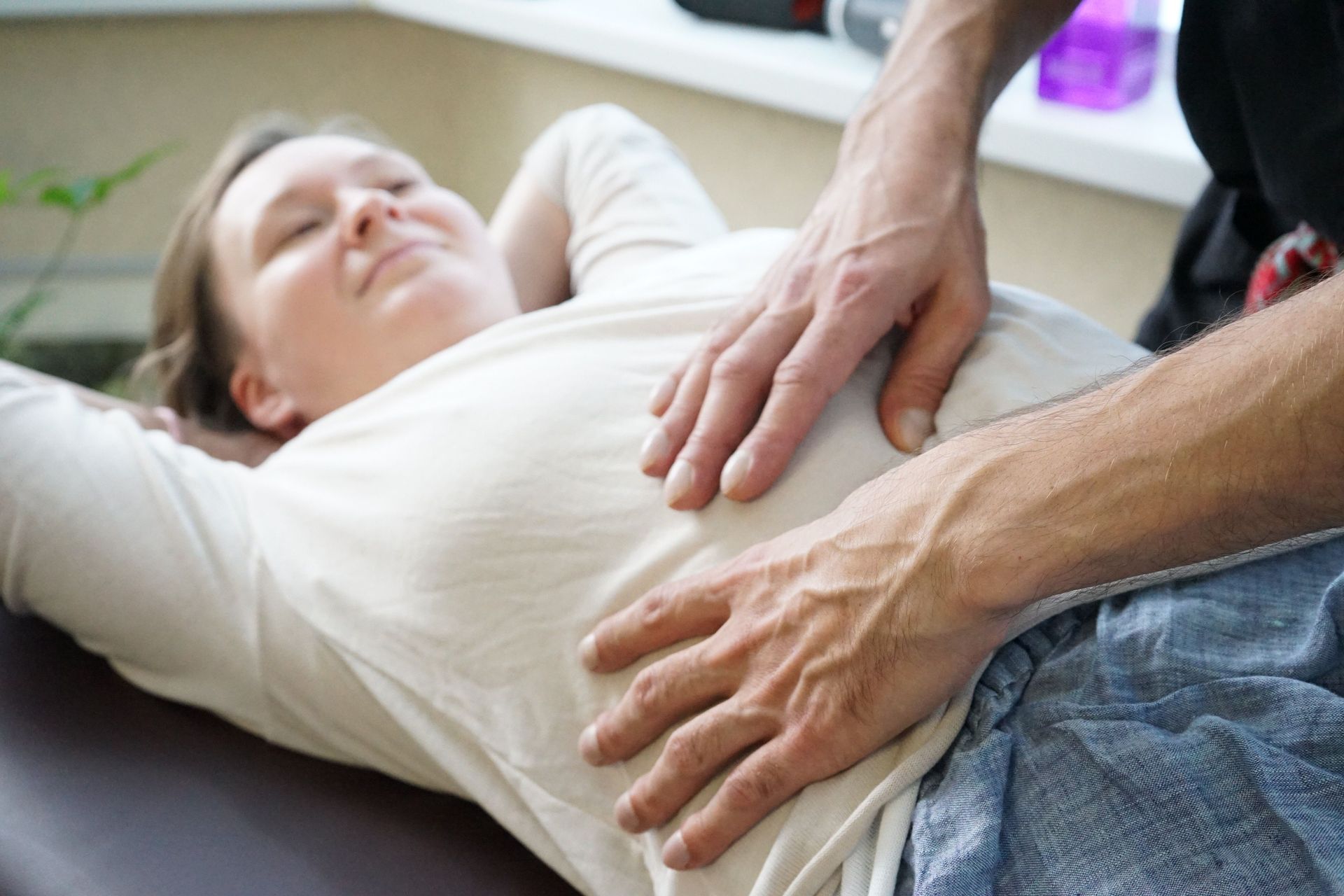 Person receiving a  prenatal massage