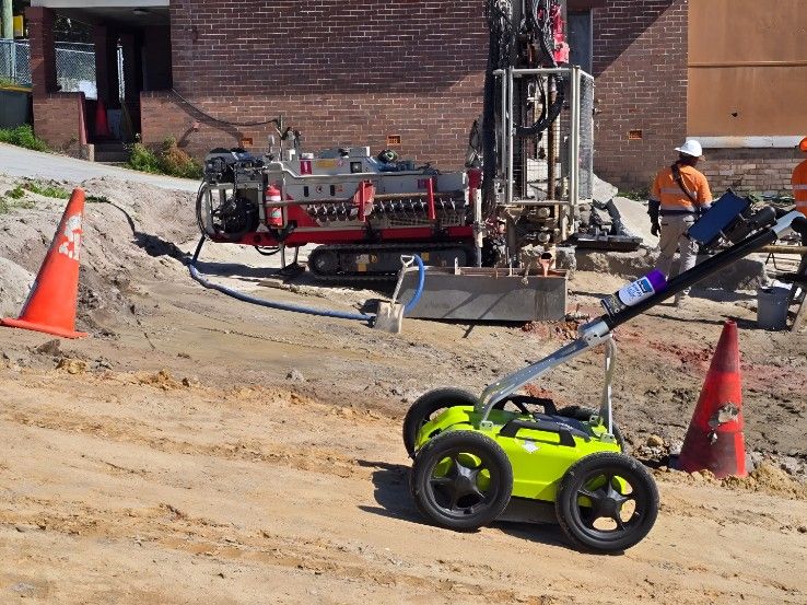 A Construction Site With Cones and a Radar Robot — Dowds Pipe and Cable Locating in Farmborough Heights, NSW