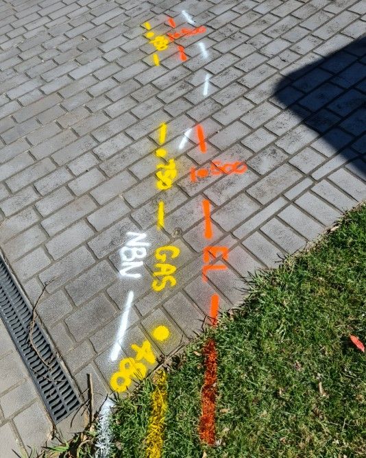 The Word Gas is Painted on a Brick Sidewalk — Dowds Pipe and Cable Locating in Bondi, NSW