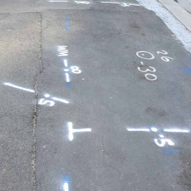 The Pipe Number is Painted on the Side of the Road — Dowds Pipe and Cable Locating in Goulburn, NSW
