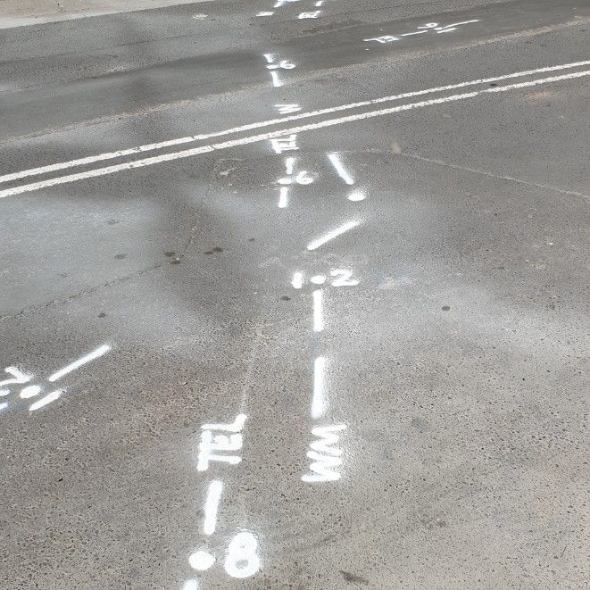 A White Line Painted on the Side of a Road — Dowds Pipe and Cable Locating in Goulburn, NSW