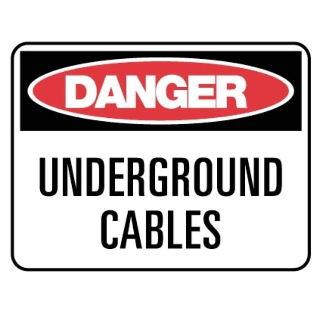 a sign that says danger underground cables — Dowds Pipe and Cable Locating in Farmborough Heights, NSW