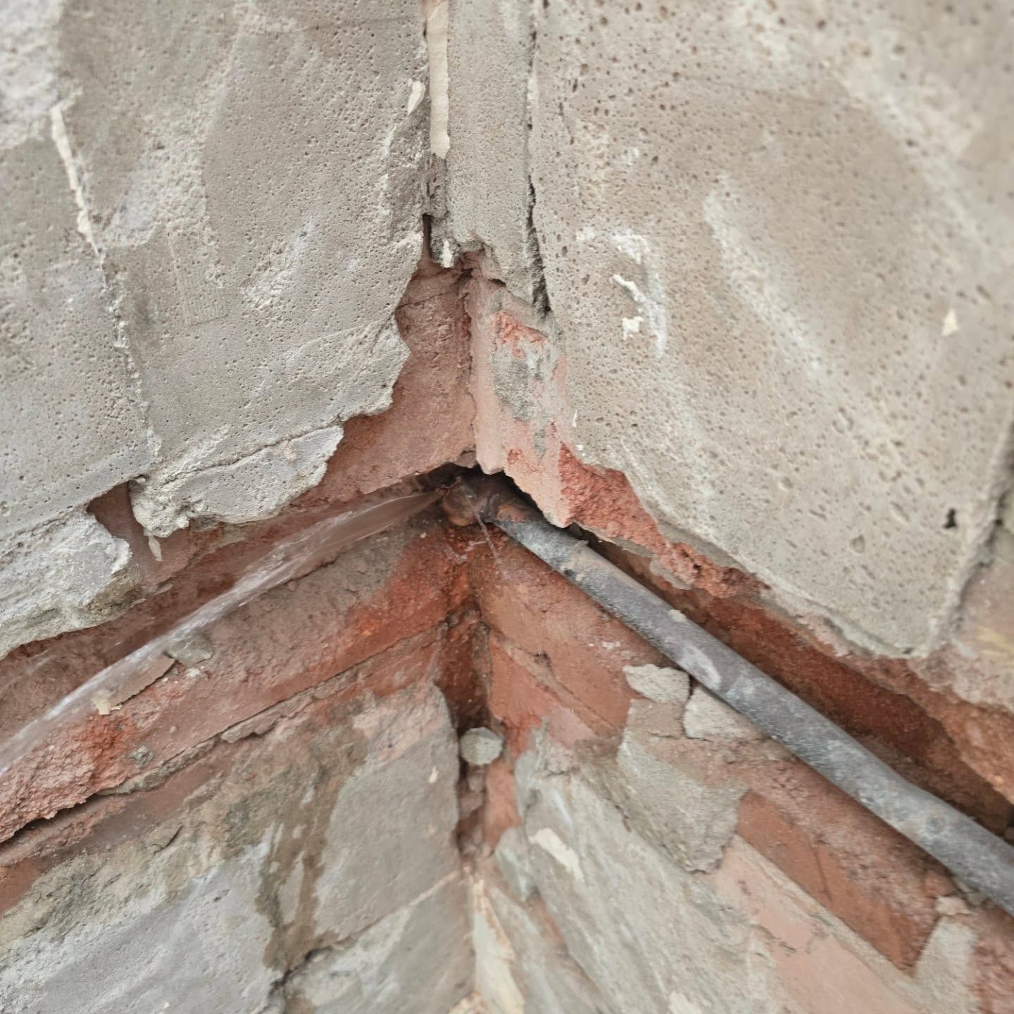 water leaking out of concrete walls — Dowds Pipe and Cable Locating in Farmborough Heights, NSW