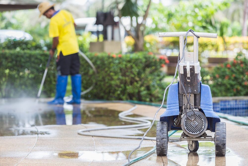 Worker Cleaning Commercial Flooring — Toowoomba Cleaning Co in Highfields, QLD