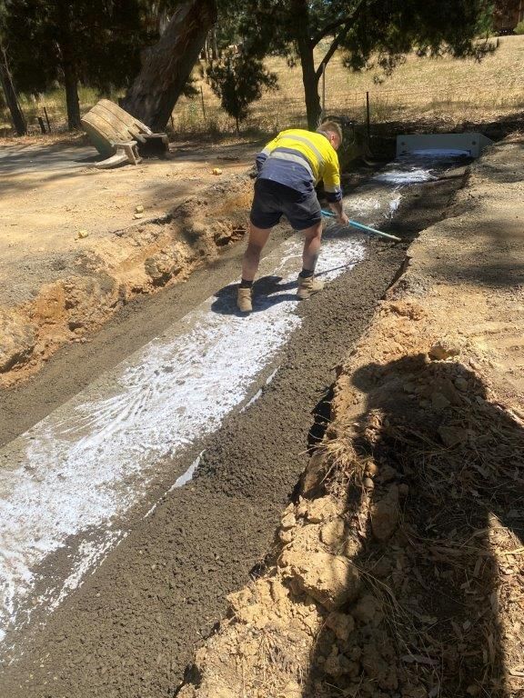 Man Working on Culvert — Ballarat VIC — Ballarat Excavation & Transport