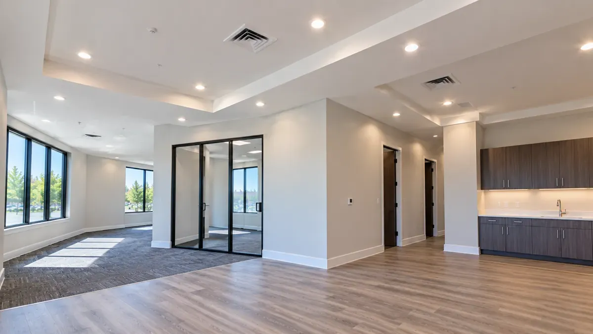 Smoothly finished drywall walls and ceilings in a renovated Delano, CA office.