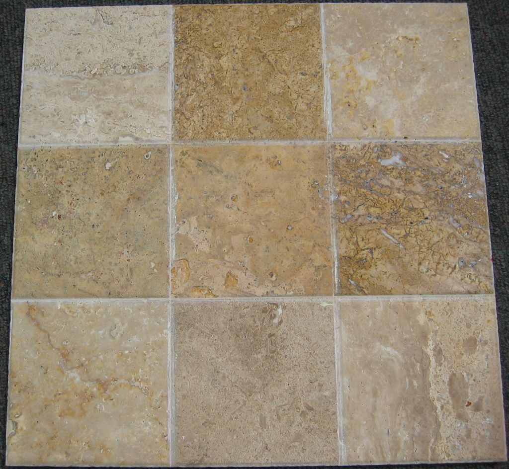 A square of tiles with different shades of brown