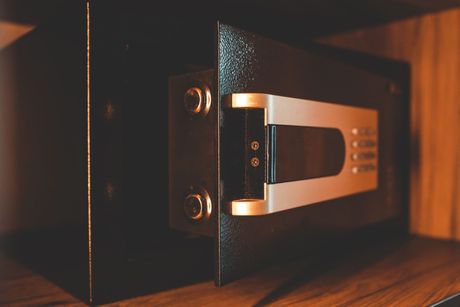 Gun safe featuring keypad entry and heavy reinforced hinges. Gun safe featuring keypad entry and heavy reinforced hinges.