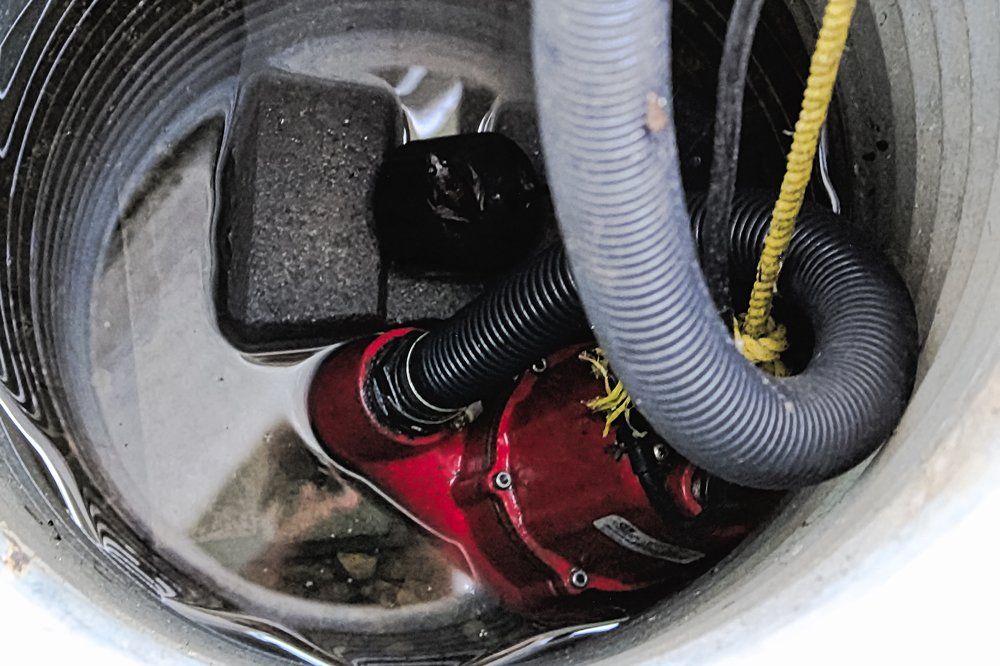 Sump Pump — Urbana, IL — Urbana Plumbing & Heating Inc Sump Pump — Urbana, IL — Urbana Plumbing & Heating Inc