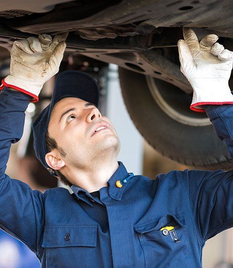 Mechanic Checking Car Condition - Hillsborough, NC - Talbert’s Automotive & Tire