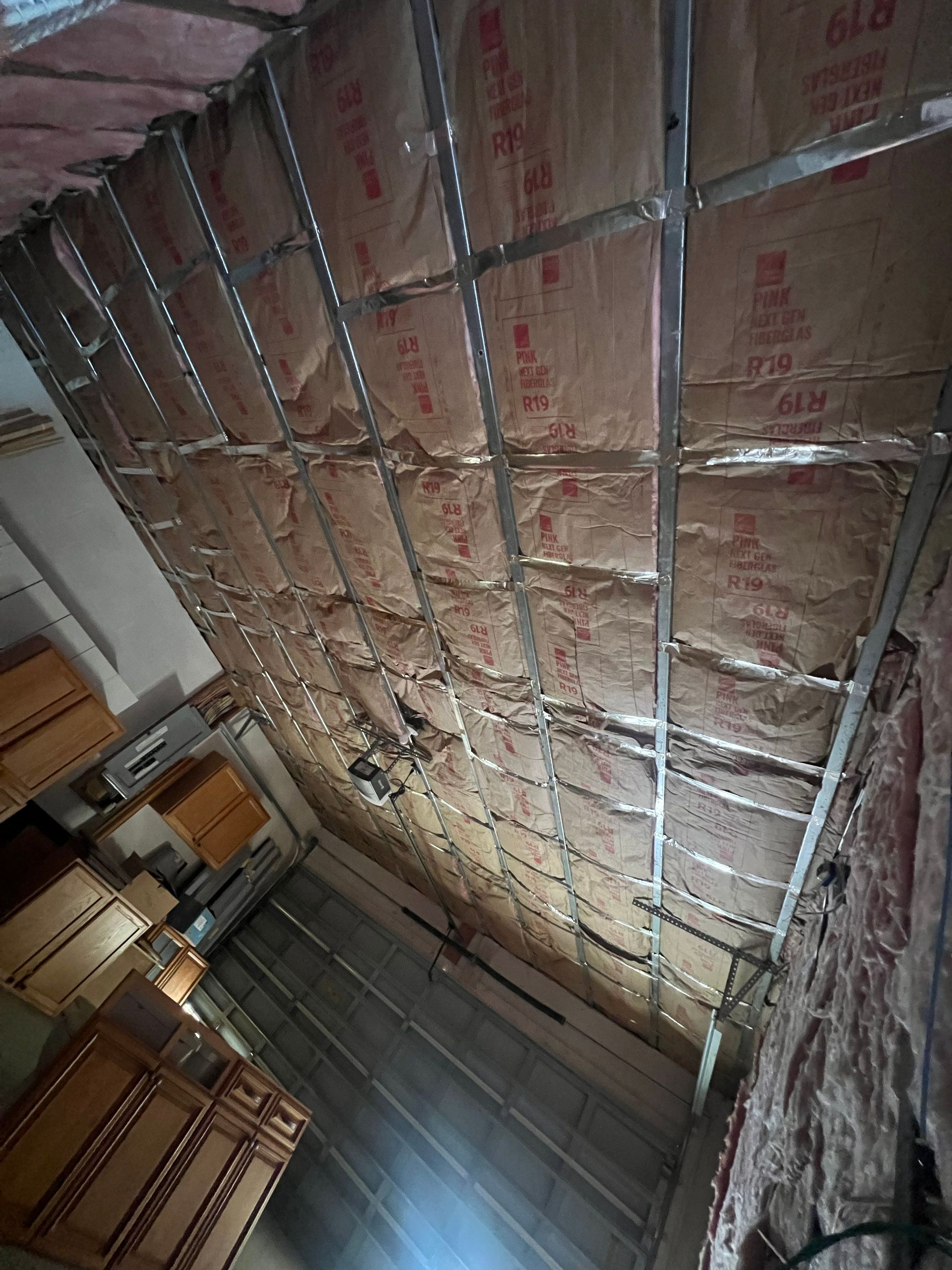 A room with a lot of insulation on the ceiling.