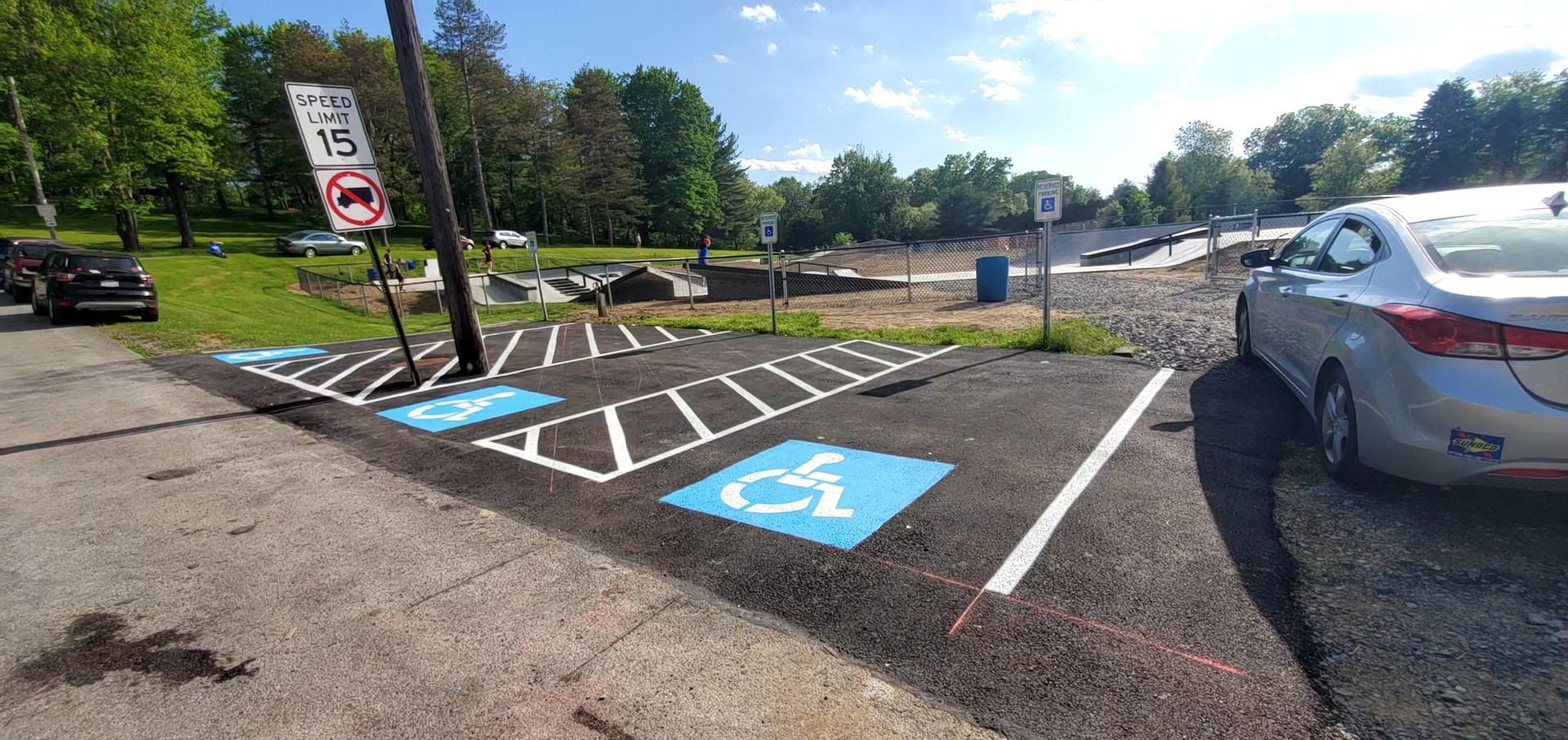 A car is parked in a handicapped parking spot.