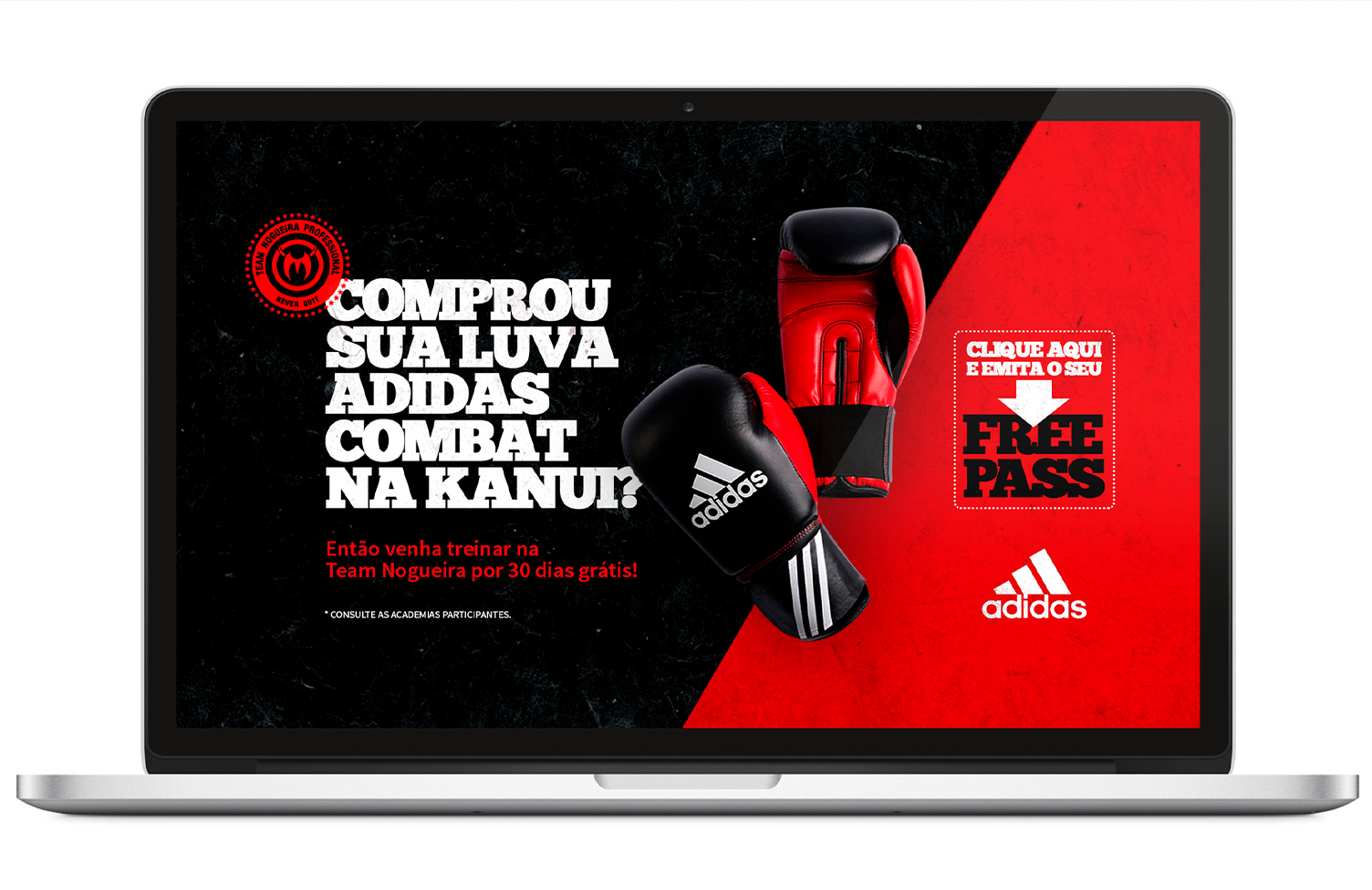 Um laptop com uma luva de boxe na tela.