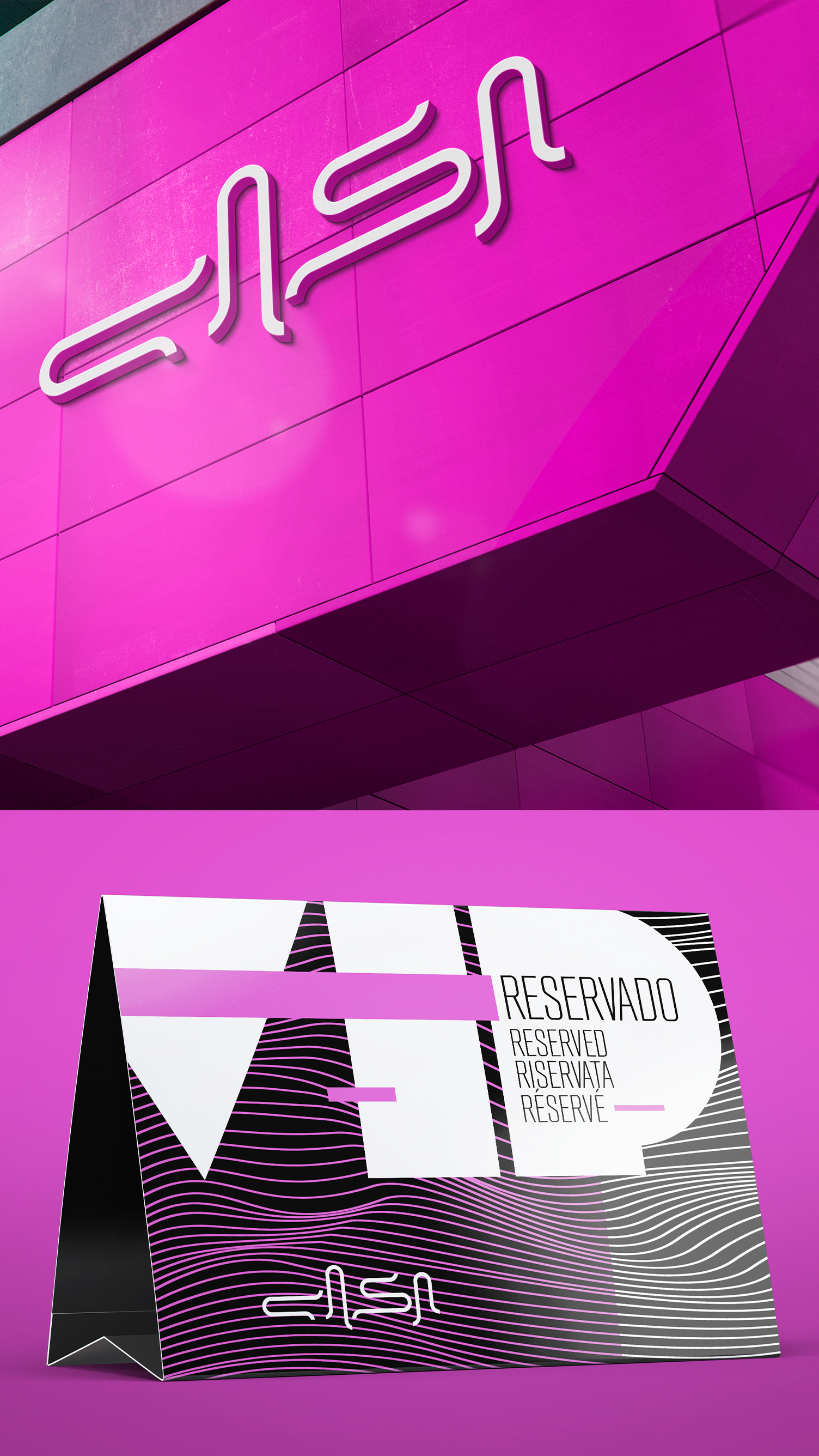 Um cartão de visita está em frente a um prédio rosa.