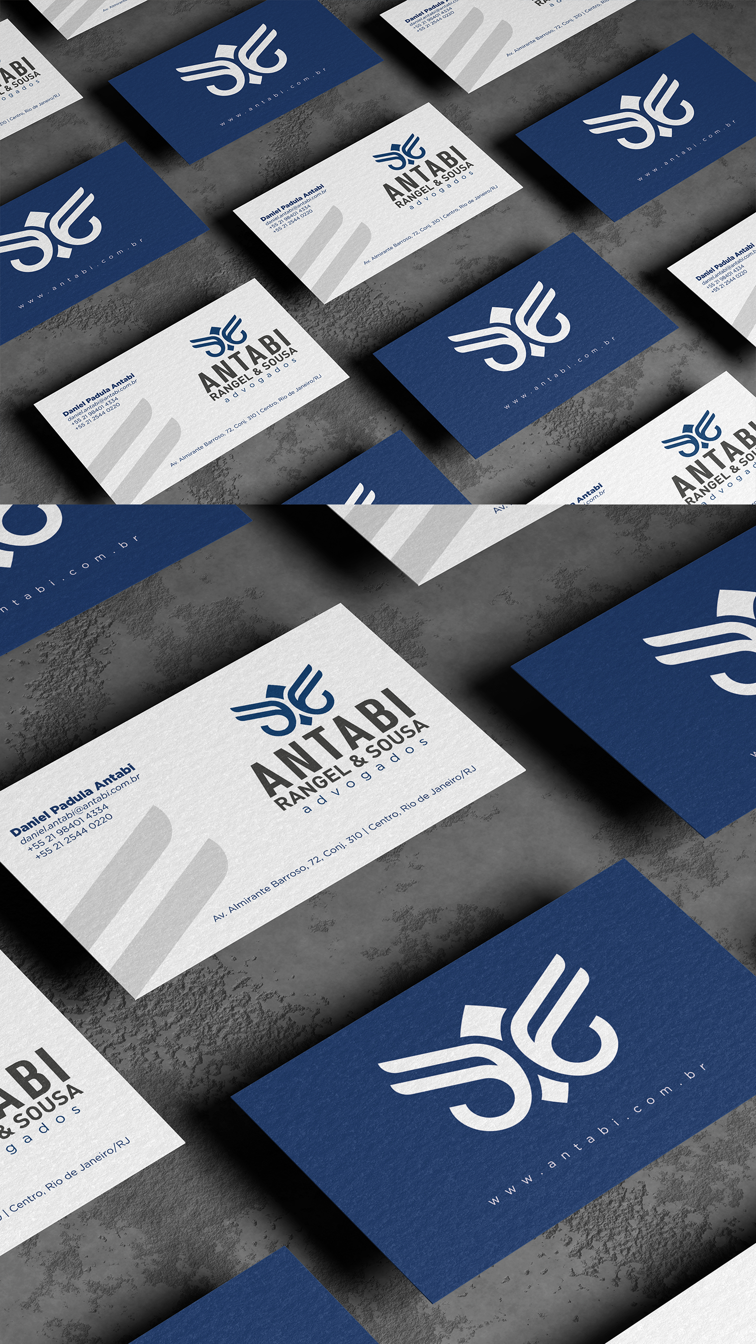 Antabi, Rangel, Sousa, & Goes A bunch of business cards are stacked on top of each other on a table.