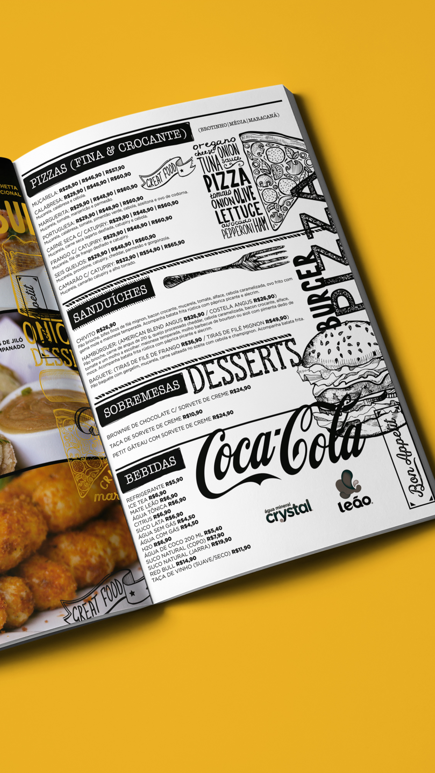A book is open to a page that says coca cola on it.